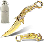Portable folding knife with gold dragon relief design
